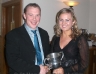 Joanne Kearney presents the Dan Doherty Memorial Cup for Club Person of the year to Paul Hasson